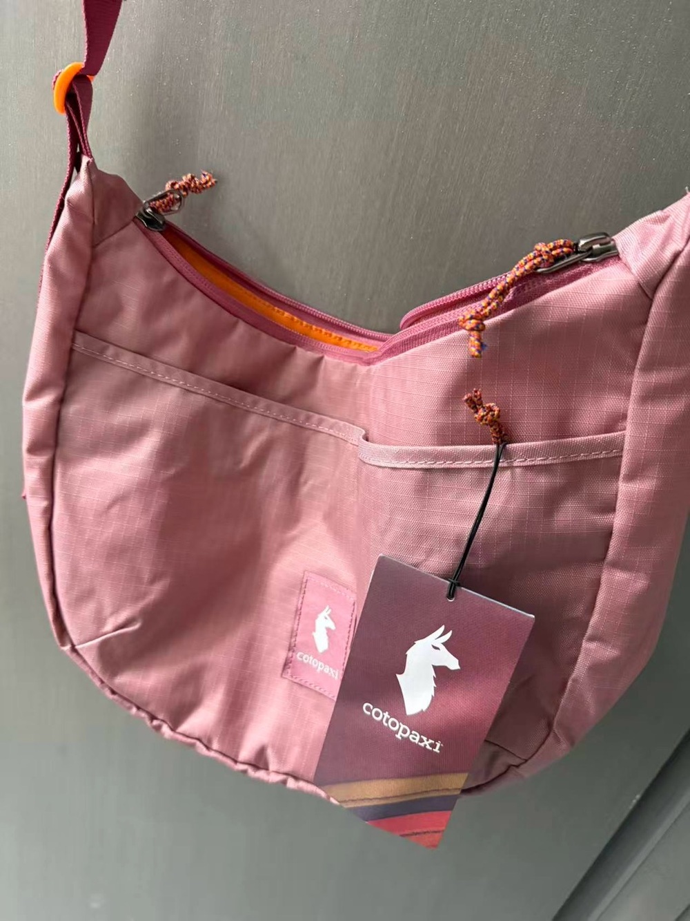 cotopaxi Dusty Pink Shoulder Crossbody Bag with Orange Trim